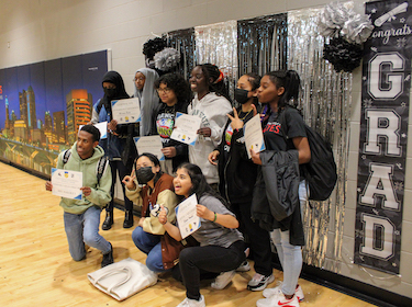 CCS students with college certificates